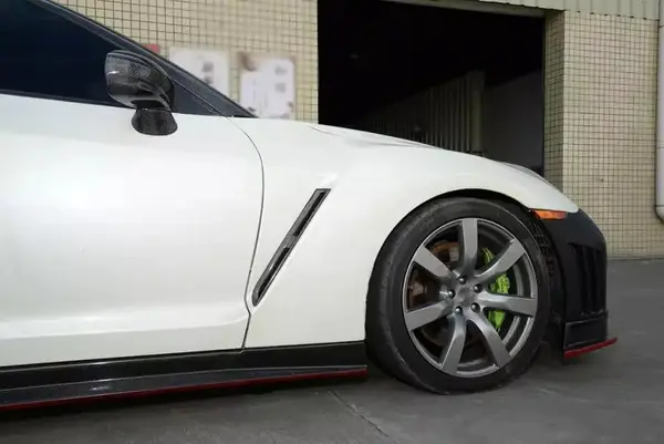 nissan-gtr-r35-pre-facelift-carbon-fibre-mirror-replacements-XXIITUNING-1_ffd9cfce-c4e1-43ed-a336-3fdb43c47a71.webp