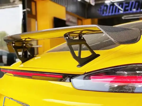 porsche-cayman-boxter-718-gt4-style-carbon-rear-wing-spoiler-XXIITUNING-4 (1).webp