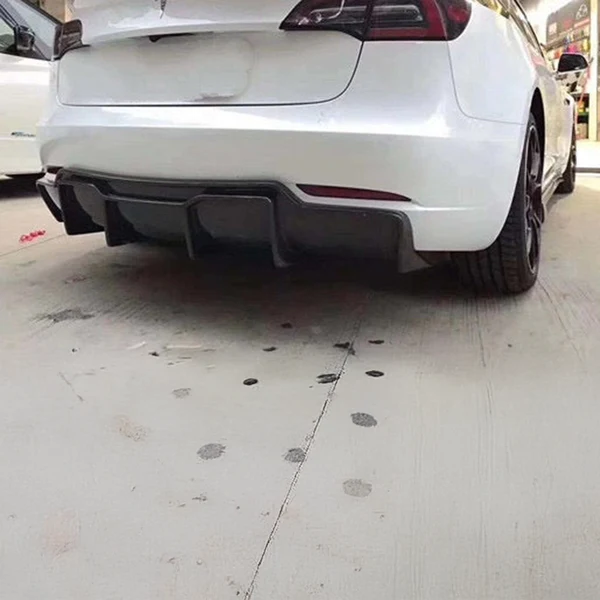 tesla-model-3-5yj3-vorsteiner-style-carbon-fibre-rear-diffuser-Normal-Carbon-XXIITUNING_2d0eaa95-6a58-48db-8cf4-1d1e0063c6e4.webp